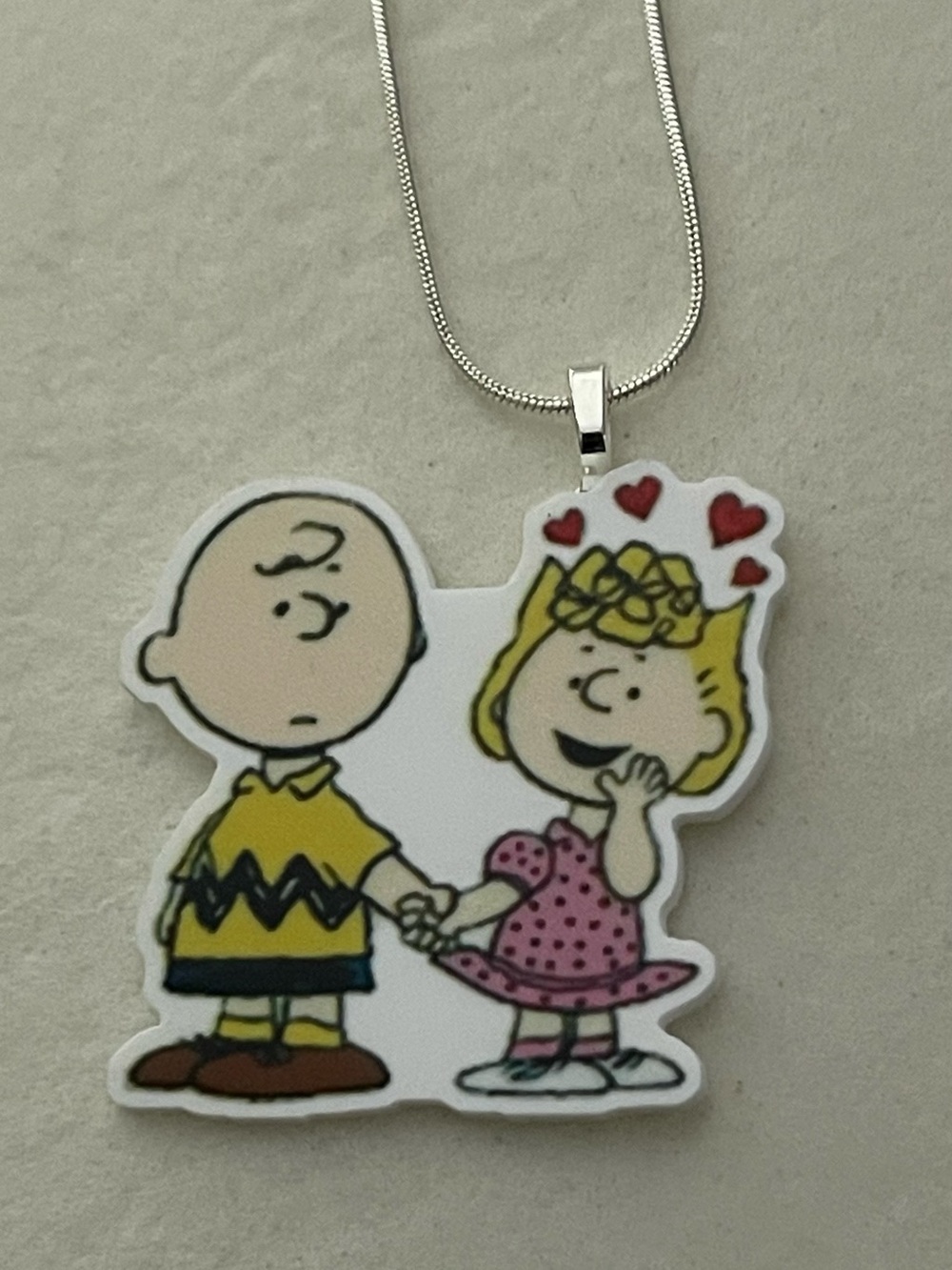 Charlie Brown & Sally Pendant Necklace - Yellow and Pink